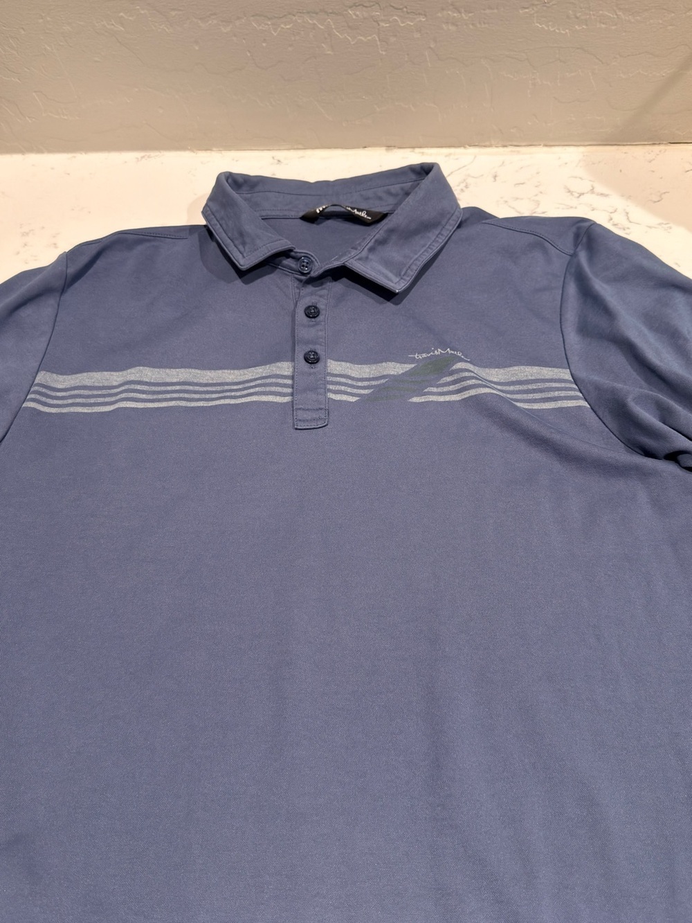 Travis Mathew Slate Blue Polo with Subtle Chest Stripe